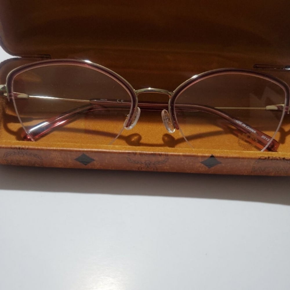 MCM AUTHENTIC WINE COLORED GLASSES NWT / CASE AND INCLUSION - Picture 2 of 5